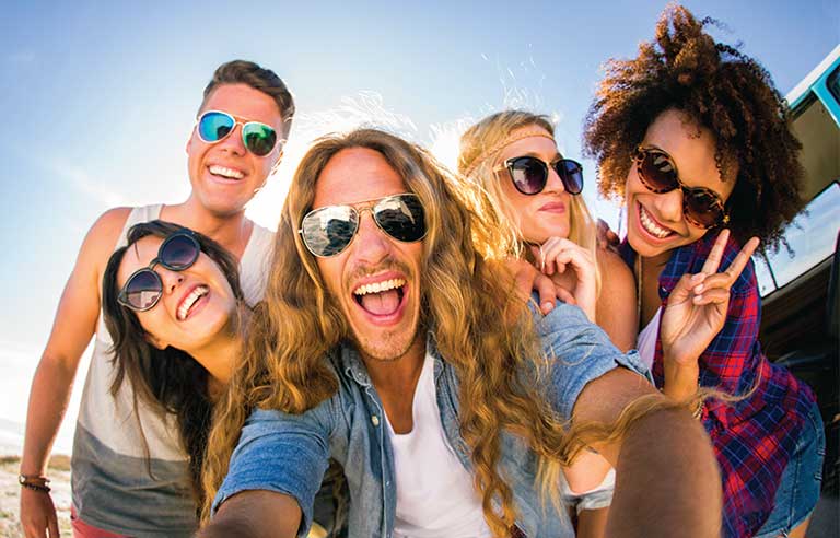 Friends taking a group selfie outdoors – Jacob Lund Photography Store-  premium stock photo